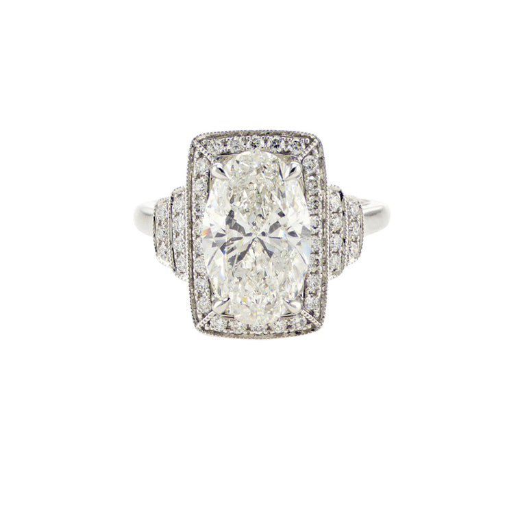 Custom Designed Engagement Ring with Oval Cut Diamond Antique-Inspired Halo in 18K White Gold