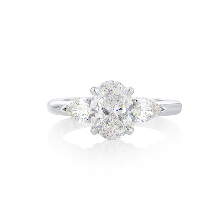 1.20 CT Oval Cut Diamond and 0.40 Cttw Pear Three Stone 14K White Gold Engagement Ring
