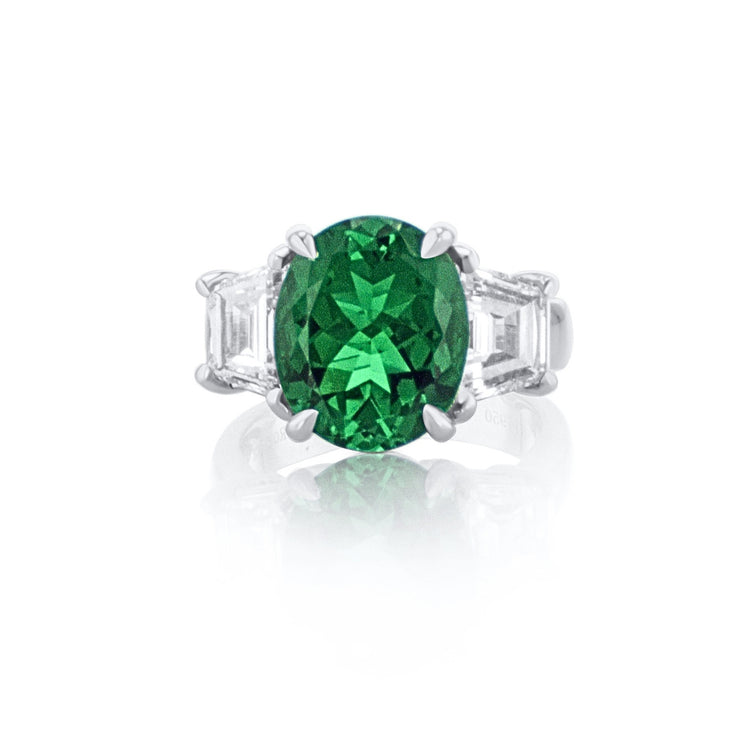 3.91 CT Oval Cut Emerald and 1.88 Cttw Lab Grown Trapezoid Cut Lab Grown Diamond Three Stone Platinum Engagement Ring