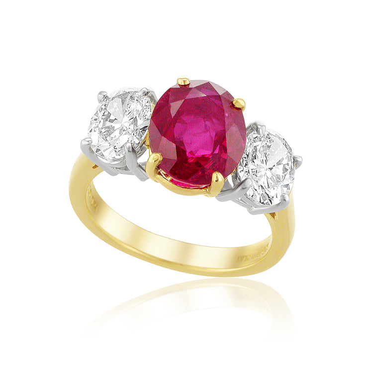 4.00 Carat Heated Ruby and 1.80 Carat Diamond Three-Stone Oval Ring set in Platinum and Gold