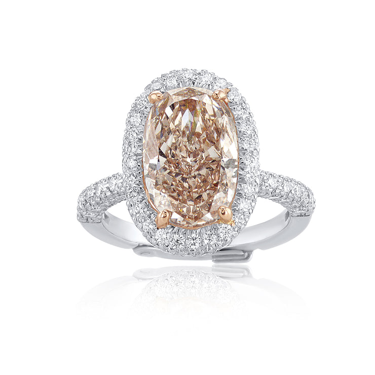 4.00 Carats Fancy Pink Oval Diamond Halo Ring GIA Certified set in Platinum and 18K Gold