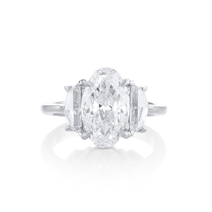 3.00 Carat Oval Diamond and Cadillac Three-Stone Ring GIA Certified set in Platinum